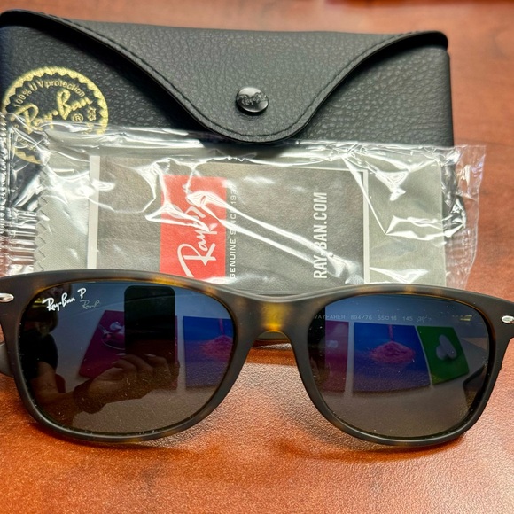 Ray-Ban Accessories - Brand New Polarized Rayban Wayfarers, mint condition.